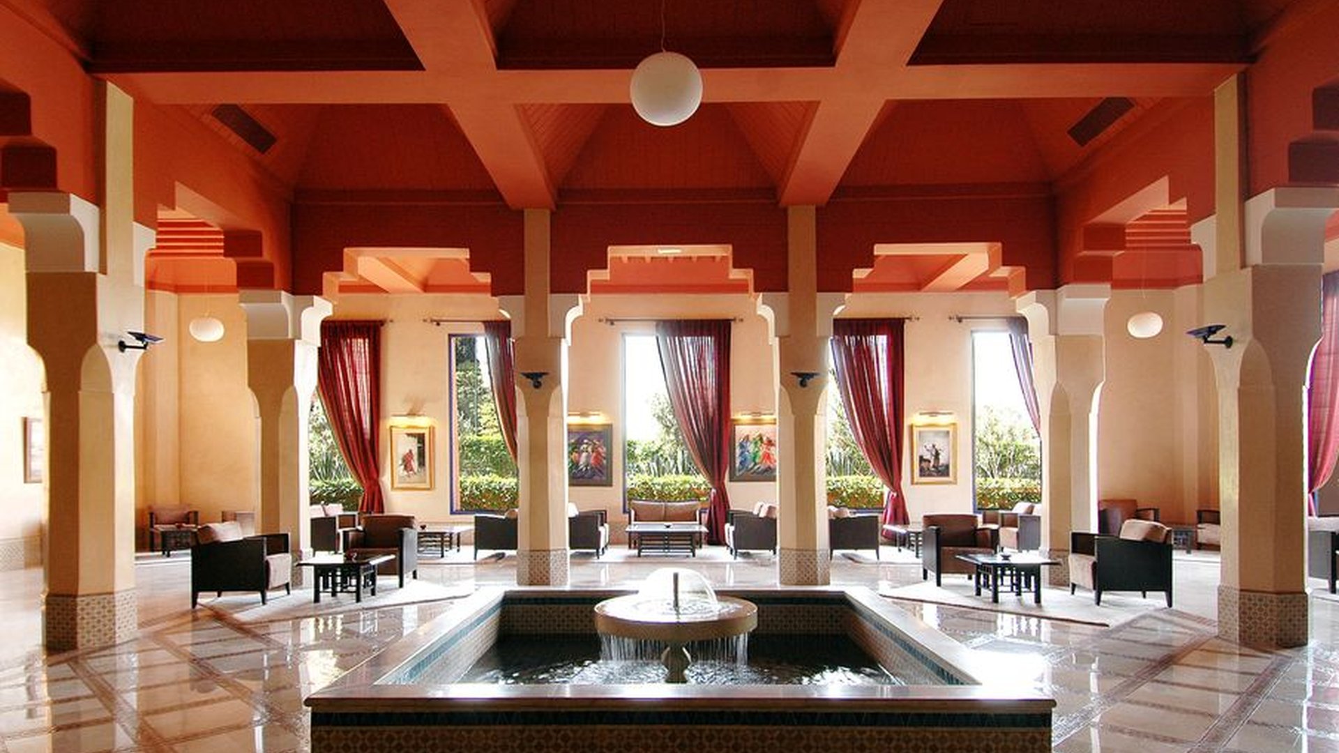 luxury resort lobby warm wood tones soft lighting