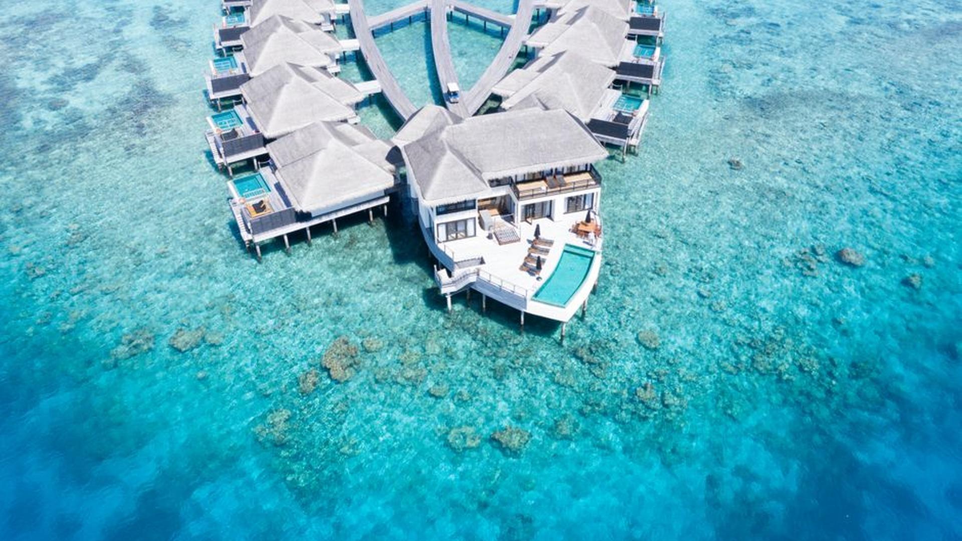 overwater villa location view resort island distan