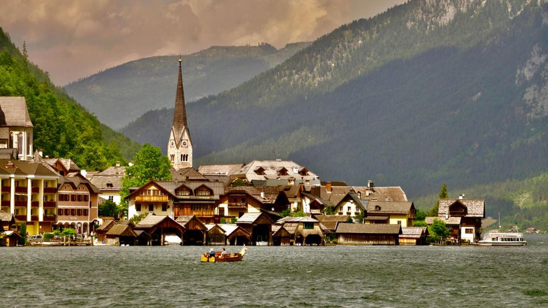 Hallstatt village morning bell children walking to