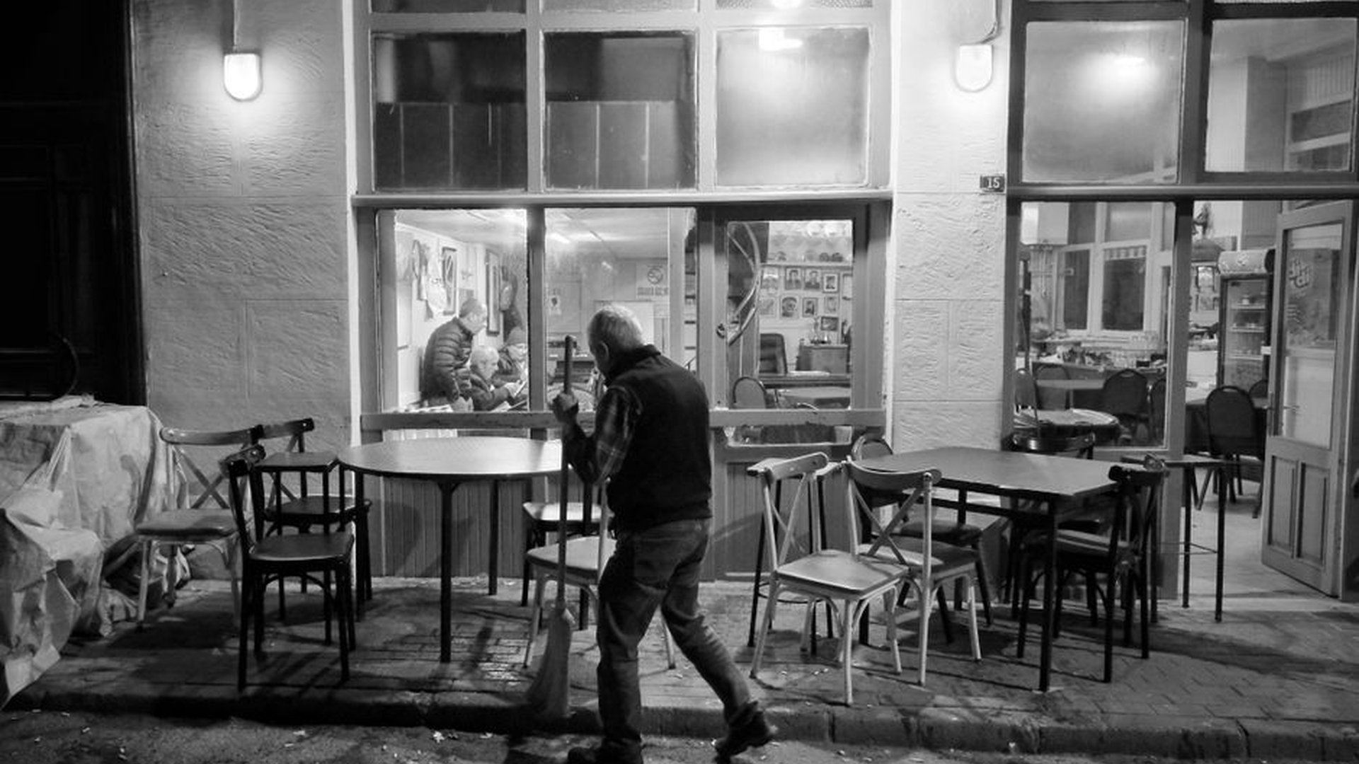 morning Vienna street sweepers café tables tram tr